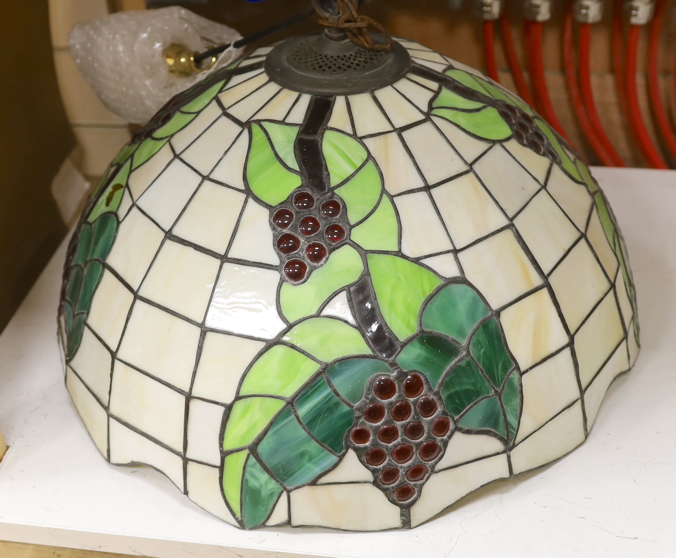 A Tiffany style circular ceiling light shade, 51cm diameter